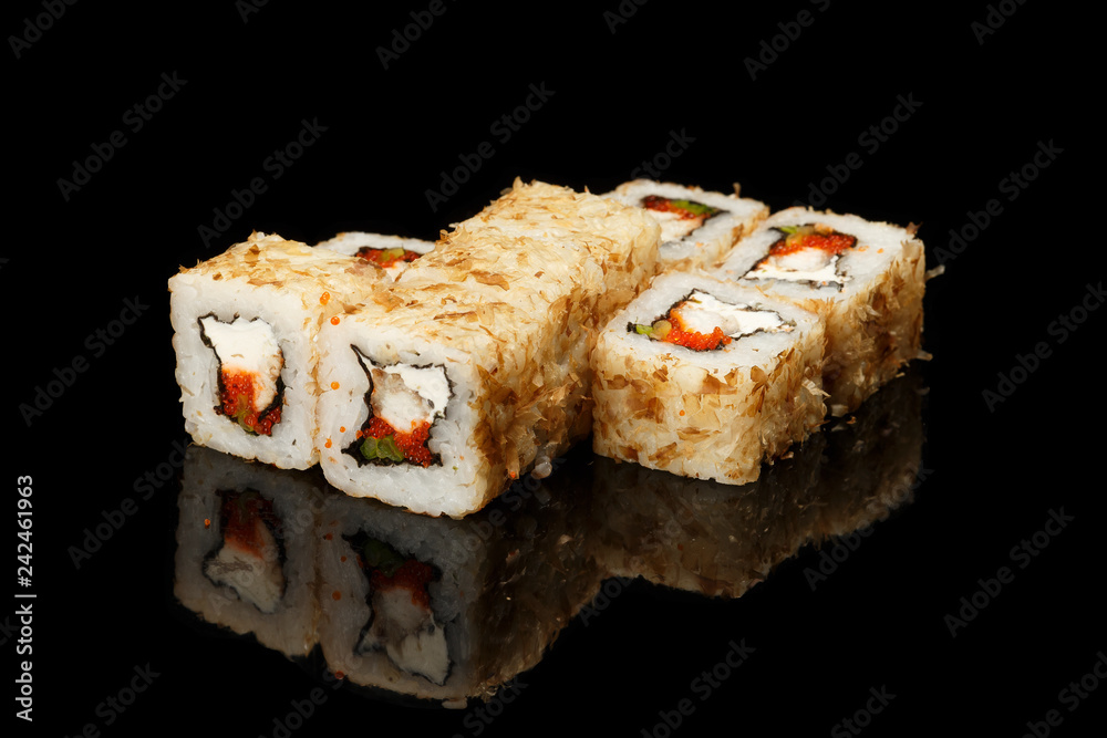 various sushi, rolls on a black background with reflection. especially for cafes and restaurants various sushi, rolls on a black background with reflection. especially for cafes and restaurants