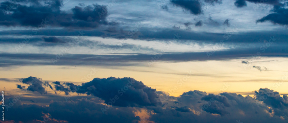 Puffy Clouds on Sunset