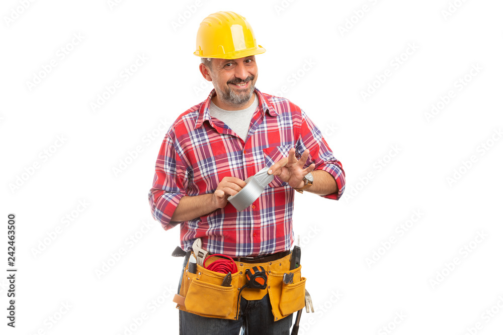 Builder presenting duct tape as unsticking it. Builder presenting duct tape as unsticking it.