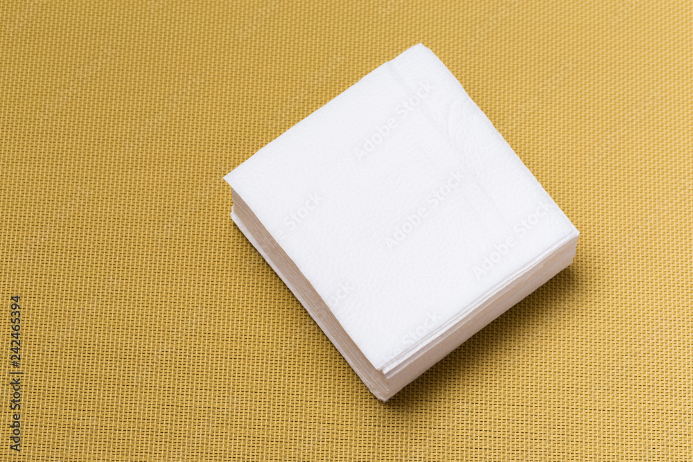 Fototapeta premium paper napkin on textured background.