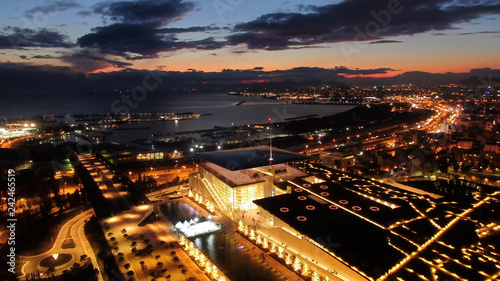 Aerial drone night shot of iconic public settlement of illuminated Stavros Niarchos Foundation and cultural centre during Christmas time, Faliro, Attica, Greece © aerial-drone