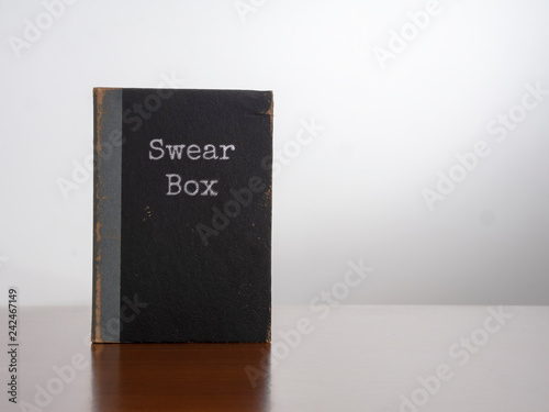 Vintage swear box, isolated on white background. New Year Resolution maybe.