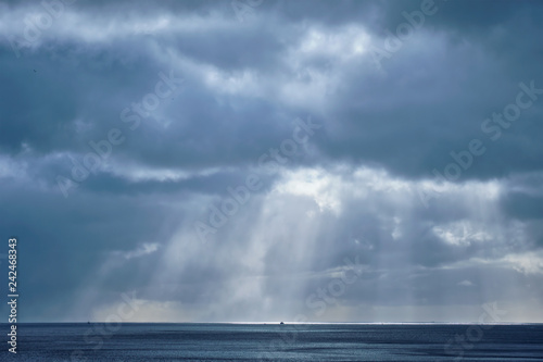 Norwegian sea in winter with sun rays