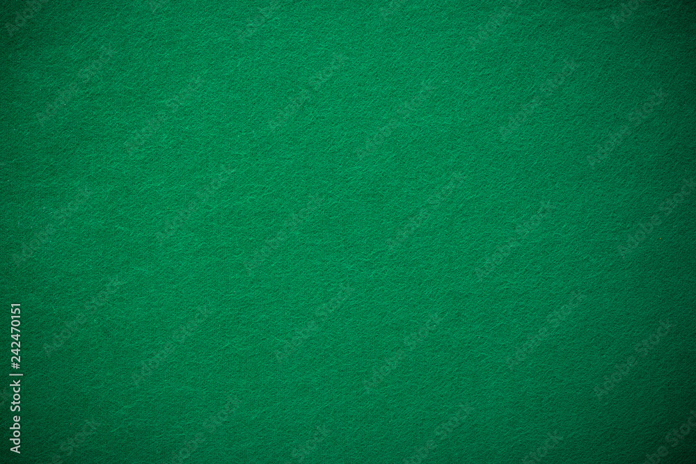 Empty green casino poker table cloth with spotlight Empty green casino poker table cloth with spotlight