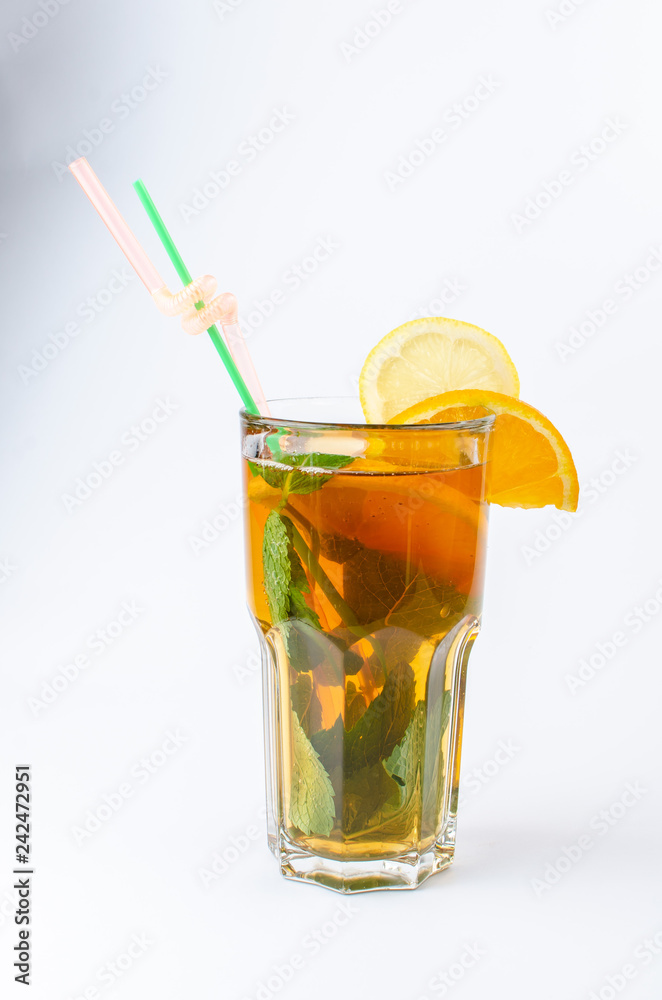tea with honey, lemon, cinnamon and mint in a clear glass tea with honey, lemon, cinnamon and mint in a clear glass