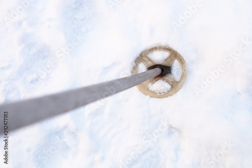 top view of the old ski pole in snowy field © vvoe