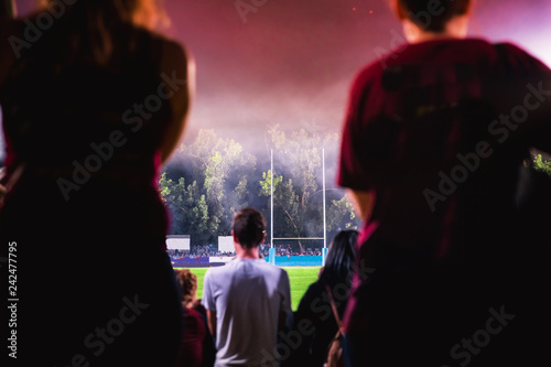 Cheering fans, American football, rugby to win 