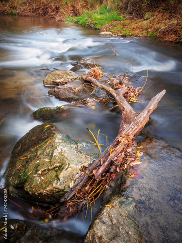 Stream of water at a small creek photo