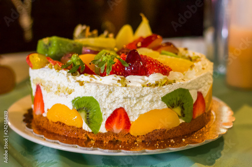 Birthday Cake full of fresh cream and fruit, Strawberries, kiwi's