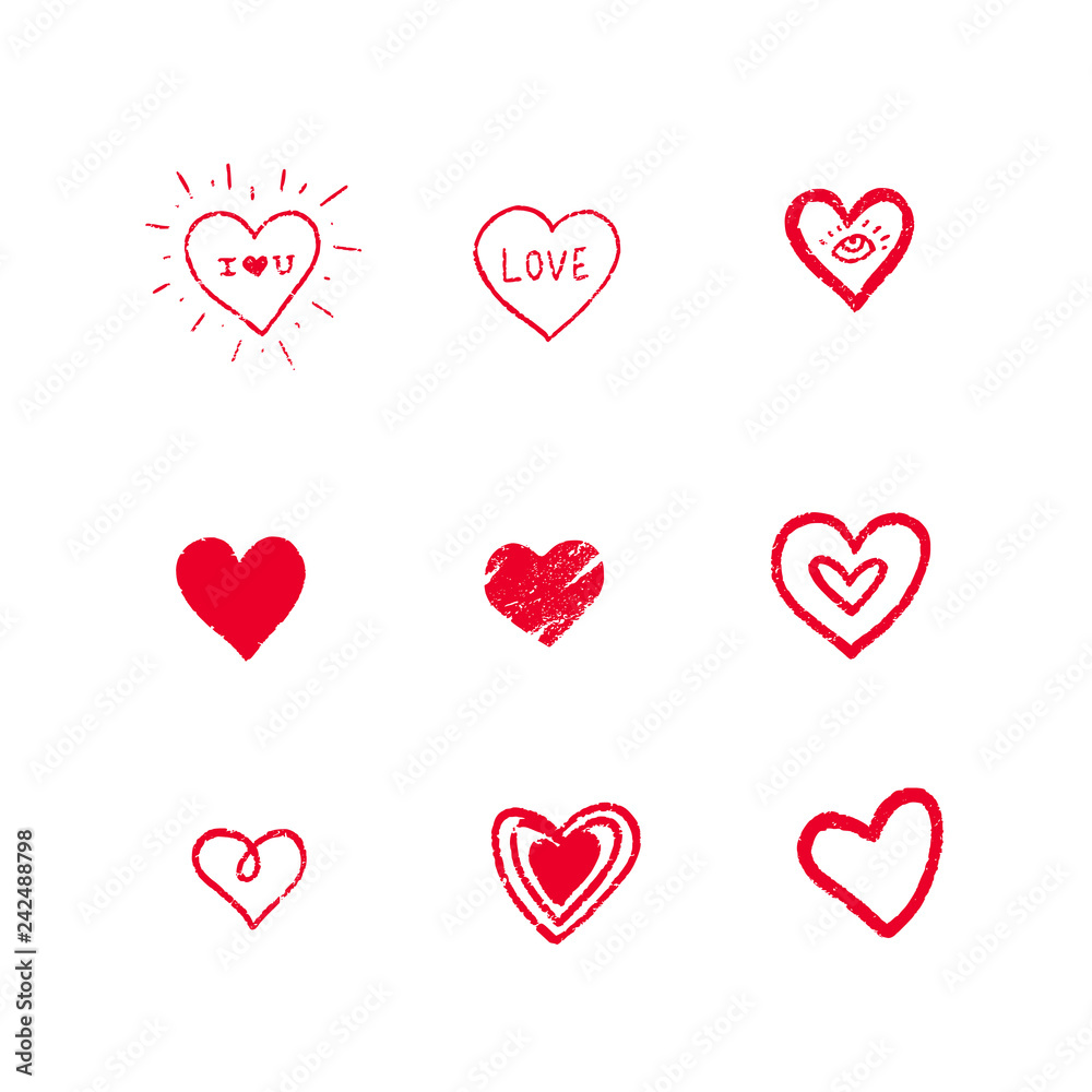 Set of red hand drawn textured vector hearts.