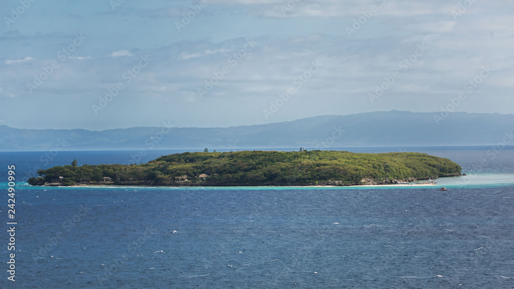 Sumilon a tropical little Island of Cebu province with a luxury resort white beaches with beach bungalows a sandbar good for a relaxing vacation Sumilon a tropical little Island of Cebu province with a luxury resort white beaches with beach bungalows a sandbar good for a relaxing vacation