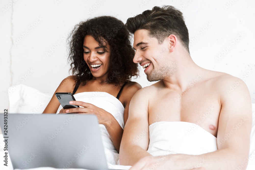 Beautiful happy young multiethnic couple relaxing Beautiful happy young multiethnic couple relaxing