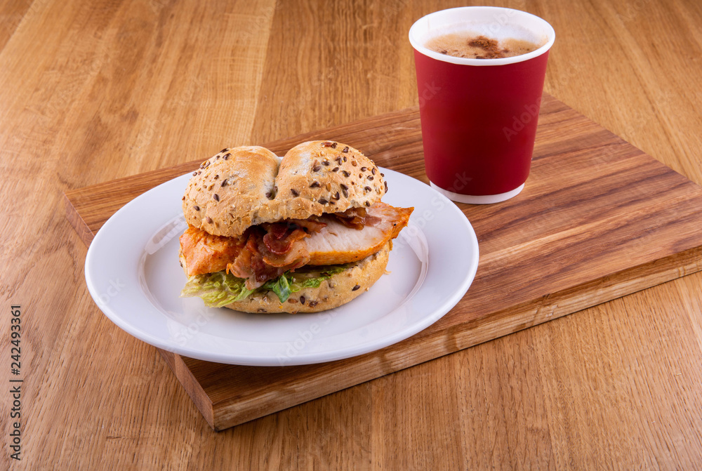 Sandwich on a plate with a cup of coffee Sandwich on a plate with a cup of coffee