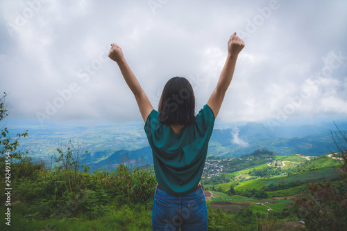 Happy young cute asian Japanese girl hipster backpack women travelling looking at beautiful sky mountains scenery views 