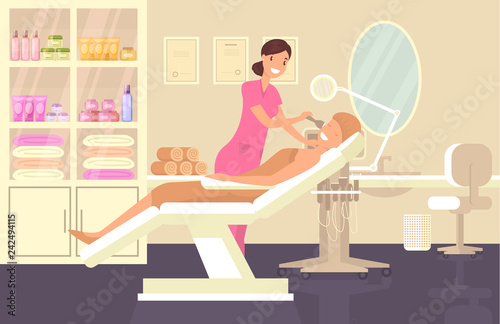Cosmetician at cosmetic salon doing face cleaning