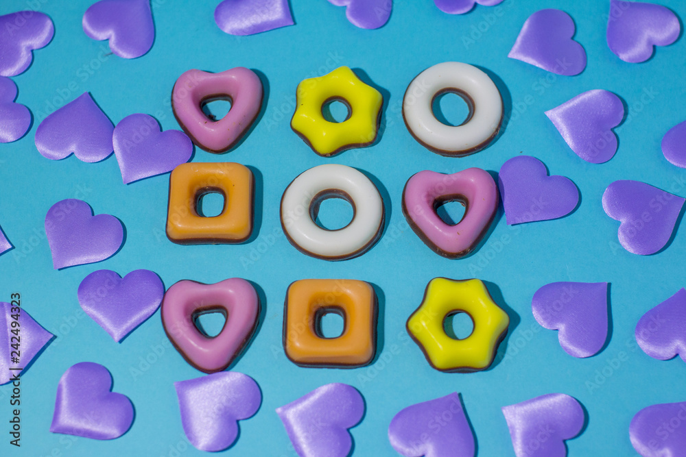 Naklejka premium International women day. A gift of candy on Valentine's day. Gift for girls. Holiday and gifts. Sweet and delicious candy.