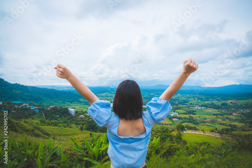 Happy young cute asian Japanese girl hipster backpack women travelling looking at beautiful sky mountains scenery views 