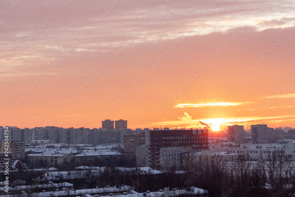 Obraz premium City landscape at dawn, sunrise with beautiful skyline and buildings. Urban landscape in the morning