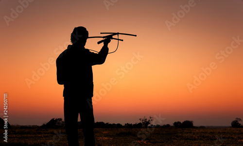 Принти на полотні man with antenna and receiver for radiotracking
