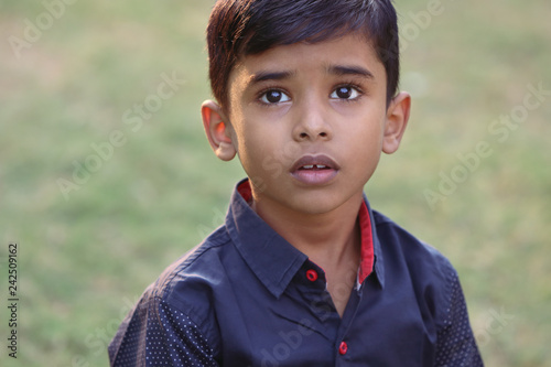 Portrait of Indian Little Boy Posing to Camera with Expression