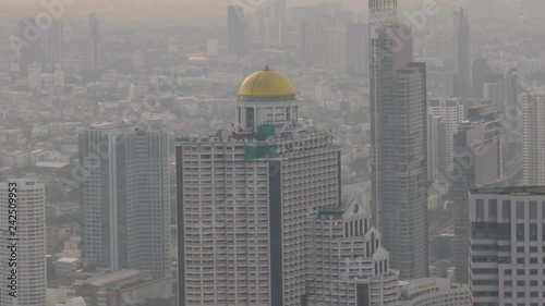 Slow moving shot of Lebua stata tower, Bangkok, Thailand. ZOOMED photo