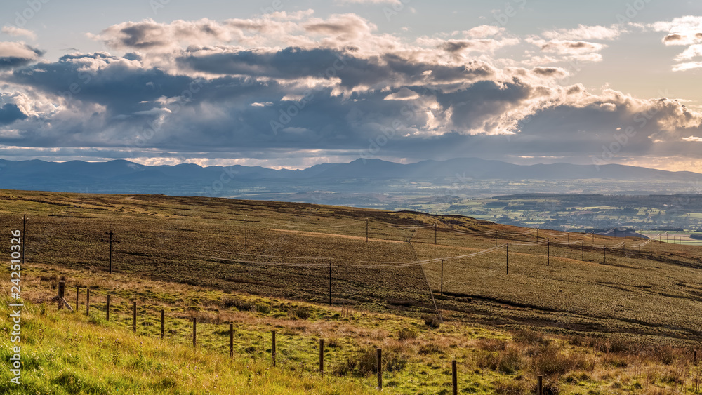 Naklejka premium View over Greenfell Raise from Hartside Top on the A686 between Alston and Melmerby, Cumbria, England, UK - with the Lake District in the background