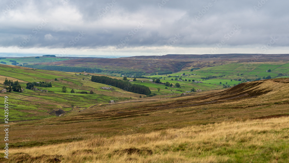 Grey clouds over the North Pennines landscape near Allenheads in Northumberland, England, UK