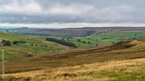 Grey clouds over the North Pennines landscape near Allenheads in Northumberland, England, UK