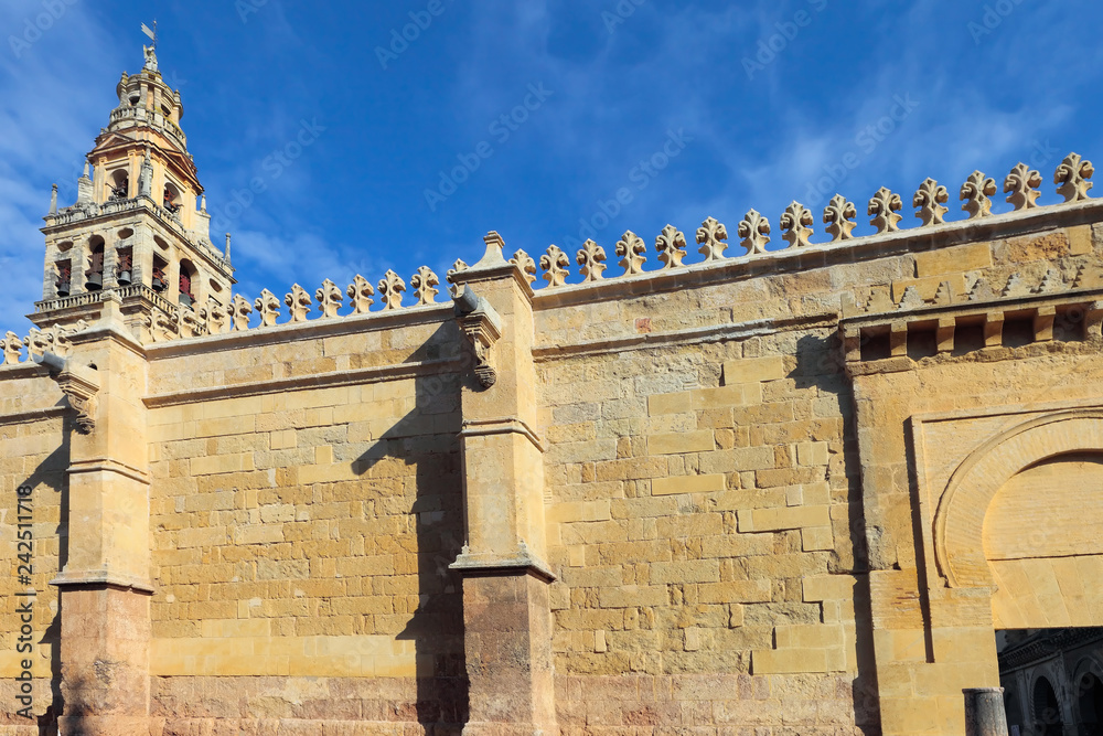 Fototapeta premium External wall of the Mosque Cathedral Mezquita of Córdoba, Andalusia, Spain