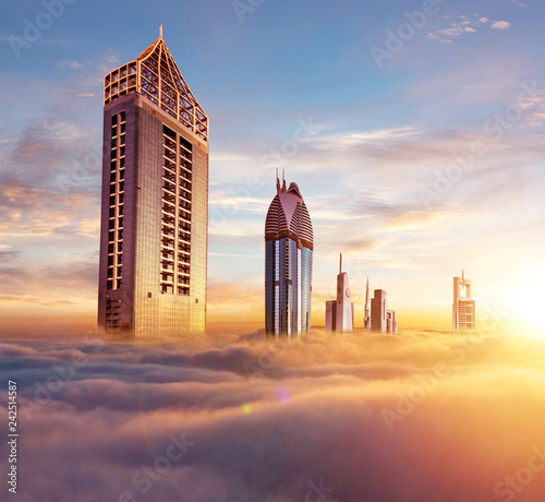 Photography Dubai sunset view of downtown covered with clouds