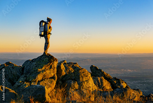 The girl is standing at the top and looking ahead