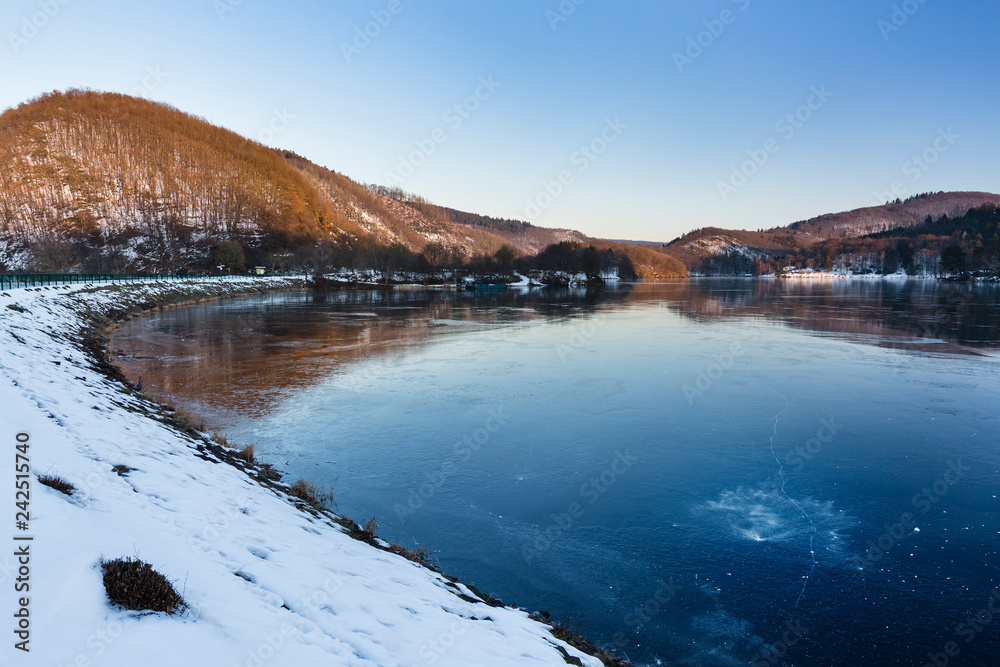 Frozen Lake Rursee At Rurberg, Germany