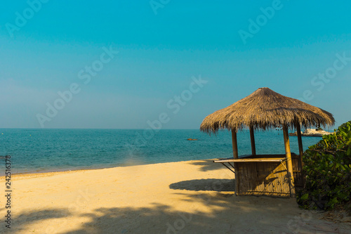 view of nice exotic bamboo hut on beach
