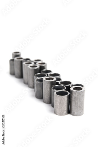 Metalworking technologies. Metal steel cylinders on a white background.