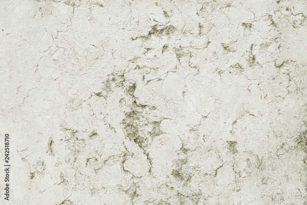 Old grey stone granite wall background texture