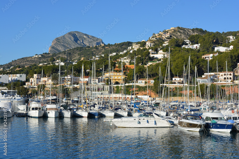 boats in harbor with Montgo mountain in the background, Javea, Alicante Province, Spain