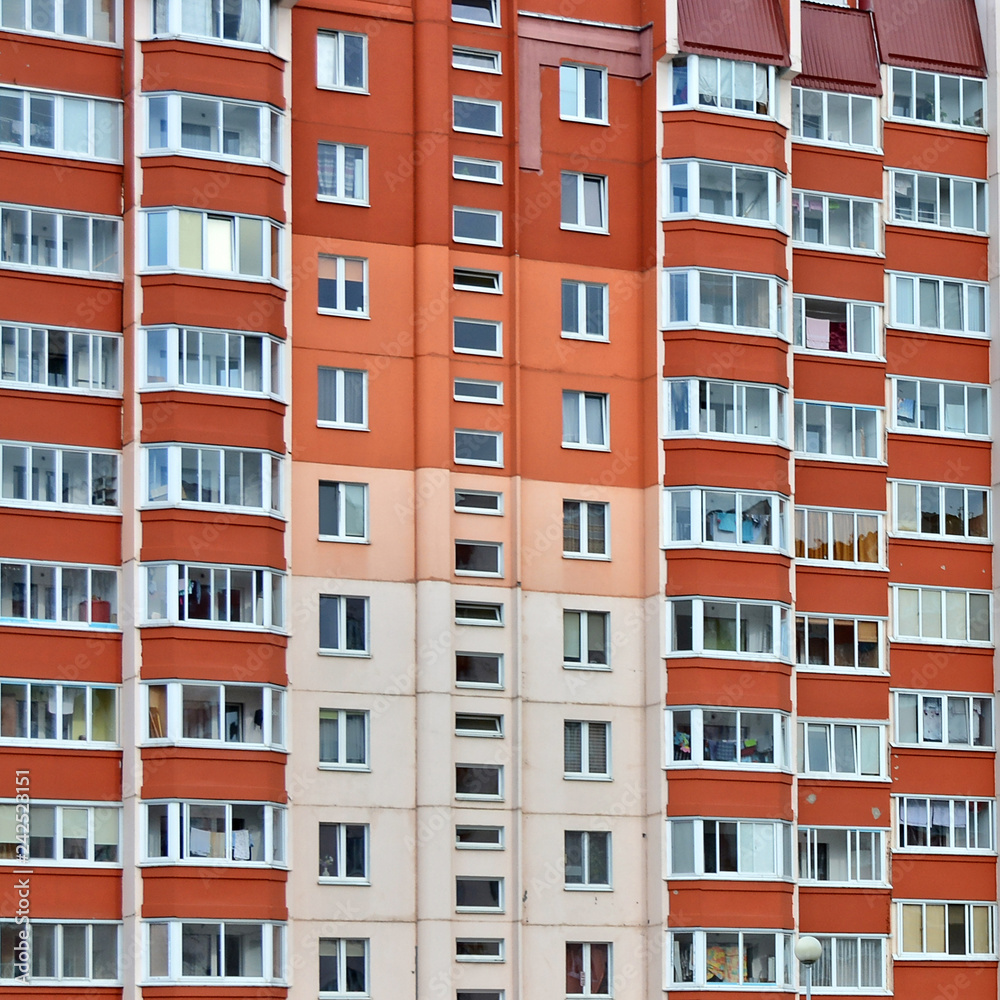 Facade of multistory apartment house. Urban landscape. Wonderful modern building. Block of flats.
