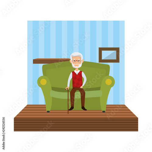 cute grandfather sitting in sofa