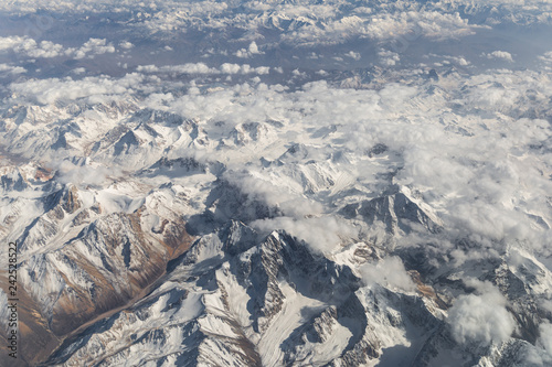 Aerial views in Tibet fly over to snowy mountains Himalaya