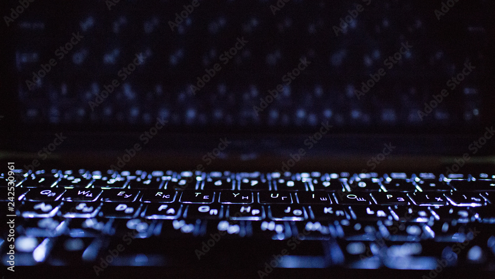Fototapeta premium Laptop keyboard and its reflection.