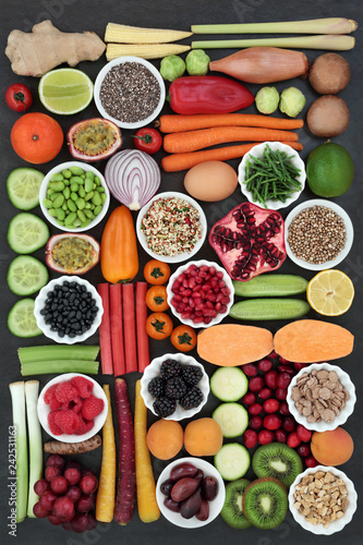 Large health food collection with fresh fruit, vegetables, seeds, grains, dairy, nuts, legumes, herbs and spices. High in antioxidants, protein, anthocyanins, vitamins and dietary fibre.