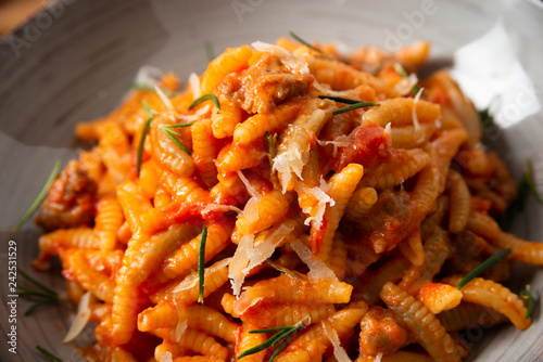 Malloreddus alla campidanese, piatto tipico della cucina sarda photo