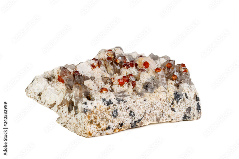 Macro mineral stone Spessartine, Feldspar, Smoky quartz, on a white background Macro mineral stone Spessartine, Feldspar, Smoky quartz, on a white background