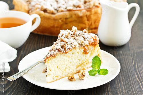 Apple cake with caramel and crumble. photo