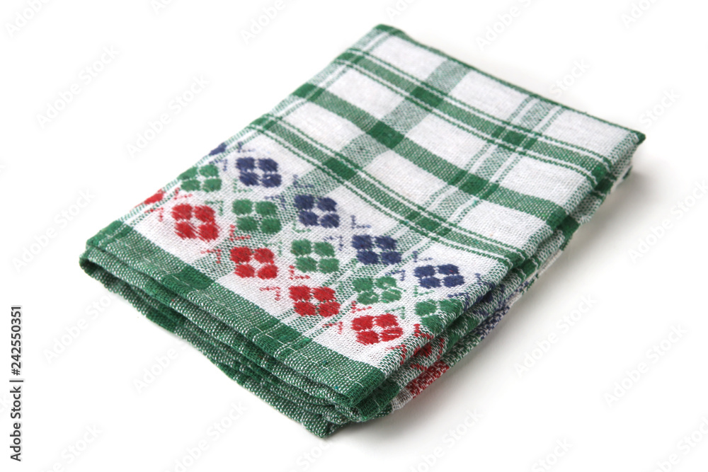 Kitchen cloth towel isolated on white background. Checkered red green napkin. Kitchen cloth towel isolated on white background. Checkered red green napkin.