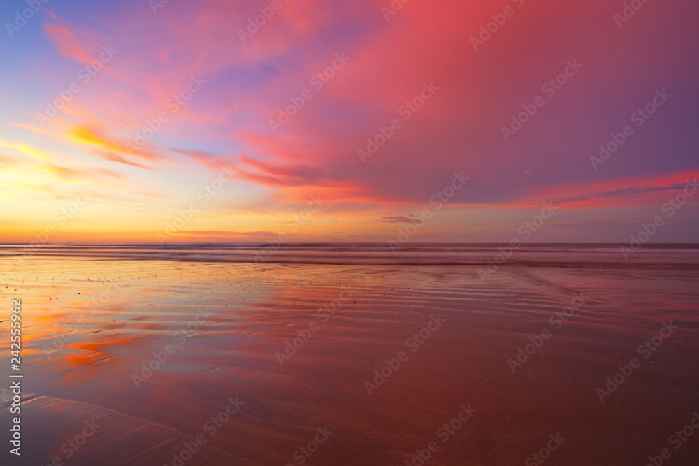 Beautiful and colorful sunset at beach