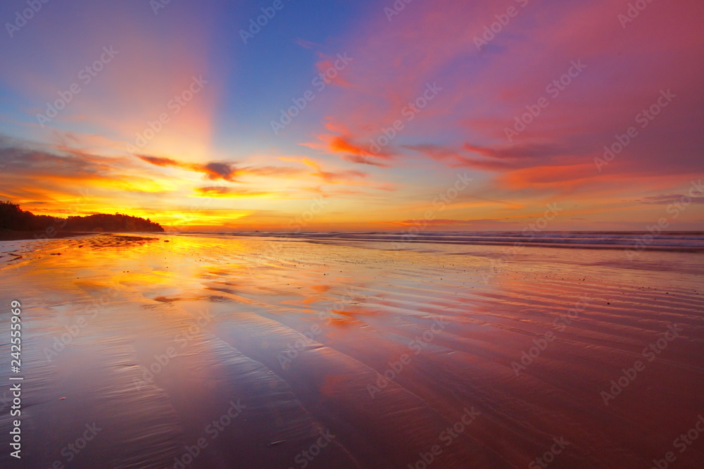 Beautiful and colorful sunset at beach