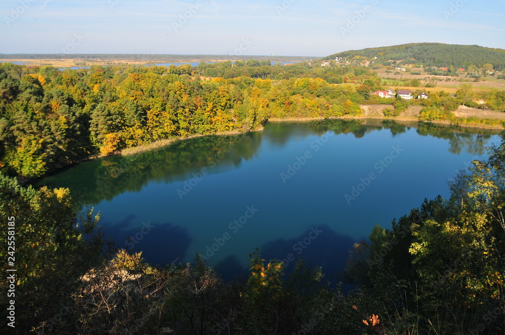 Wapnica, Poland, October 2018. The Turquoise lake also known as the Emerald Lake, it is classified as one of the most beautiful lakes of the Wolin National Park. 