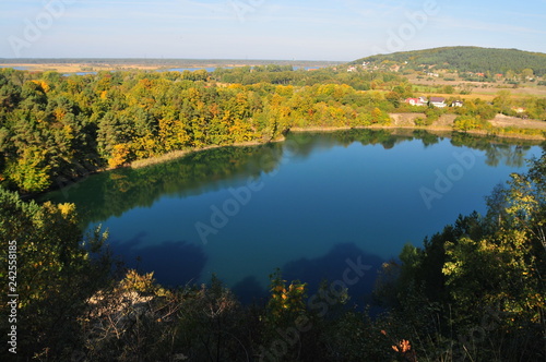 Fototapeta Naklejka Na Ścianę i Meble -  Wapnica, Poland, October 2018. The Turquoise lake also known as the Emerald Lake, it is classified as one of the most beautiful lakes of the Wolin National Park. 