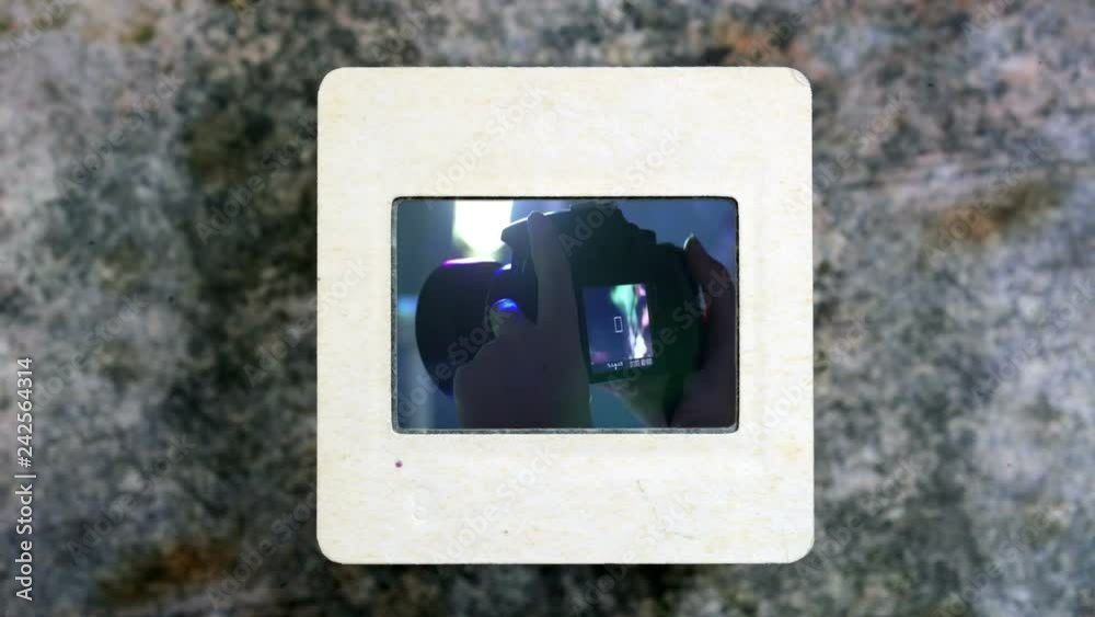 Spectator Girl Shooting On Camera on slide film